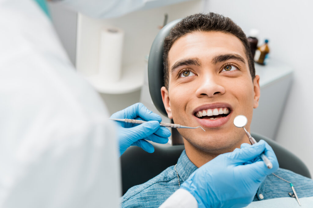 Dentist preparing for oral surgery